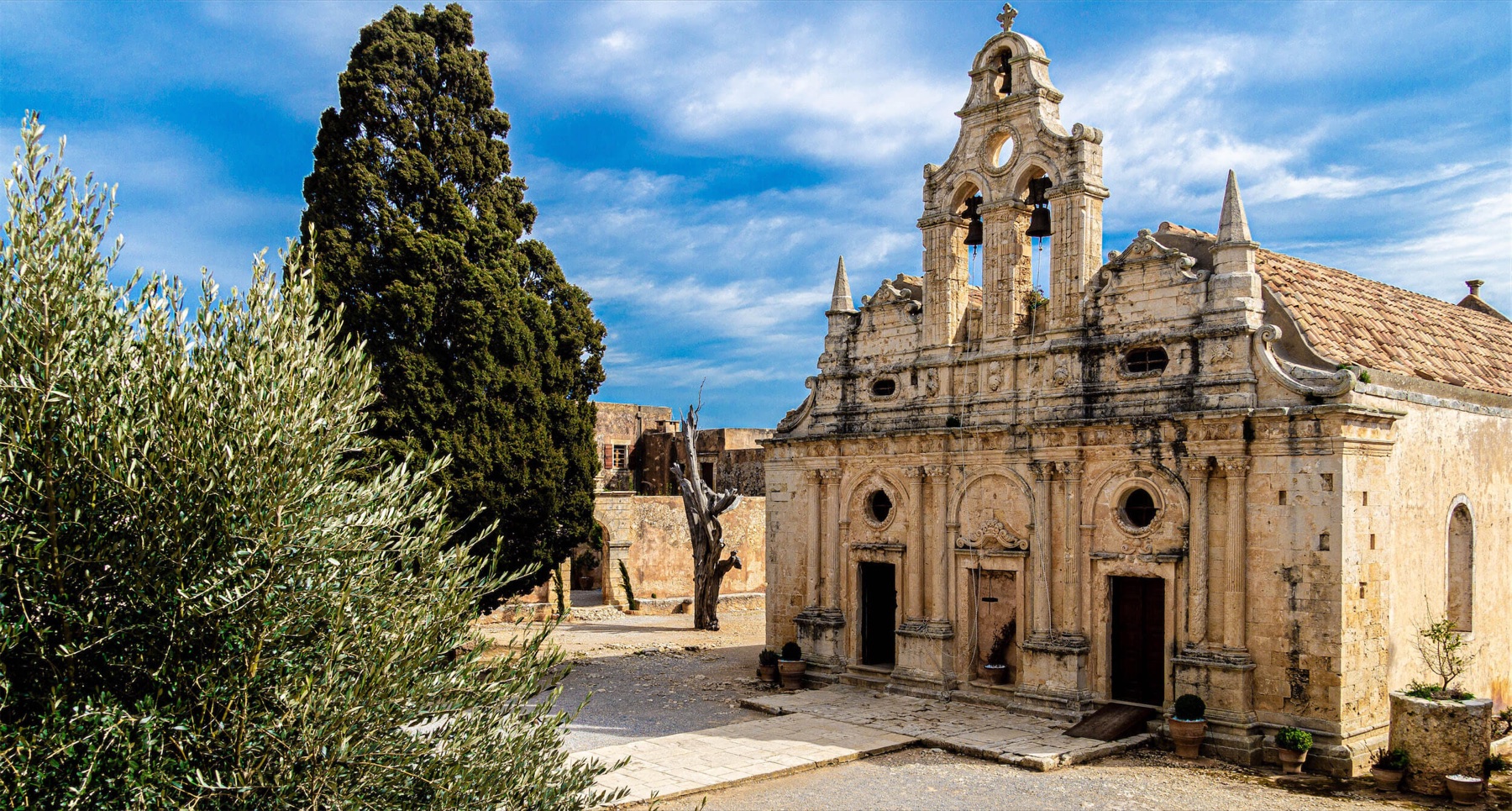 Arkadi Monastery courtyard and historic stone church