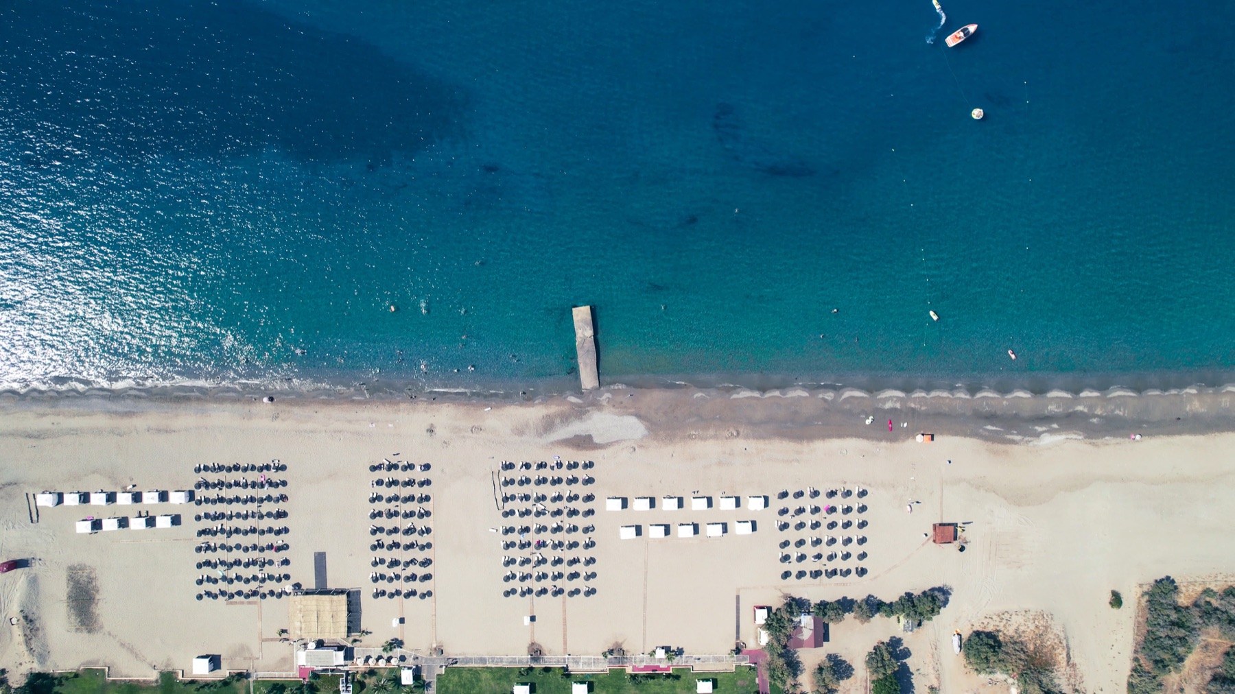 Aerial view of Rethymno beach and blue water